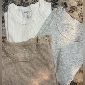 🤍3pack American Eagle classic baby tees! White, oatmeal, grey. Never worn